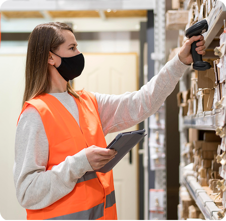 Retail worker performing a store safety check